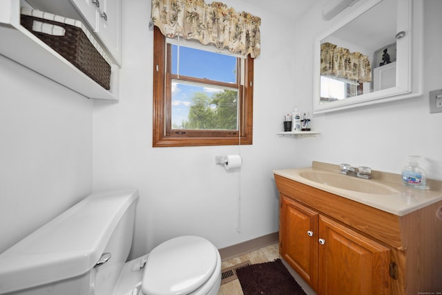 136 Reynolds Bridge Rd, Thomaston, CT 06787 - half bathroom featuring toilet and vanity