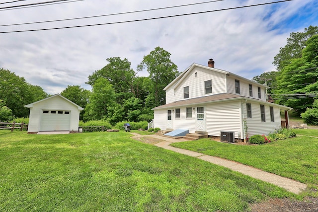 136 Reynolds Bridge Rd, Thomaston, CT 06787 - back of house with a chimney, a detached garage, an outbuilding, and entry steps