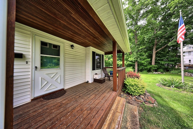 136 Reynolds Bridge Rd, Thomaston, CT 06787 - wooden porch featuring a yard