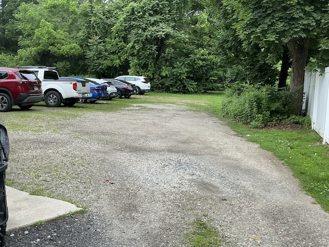 20 Berkeley St, Norwalk, CT 06850 - uncovered parking lot featuring a forest view