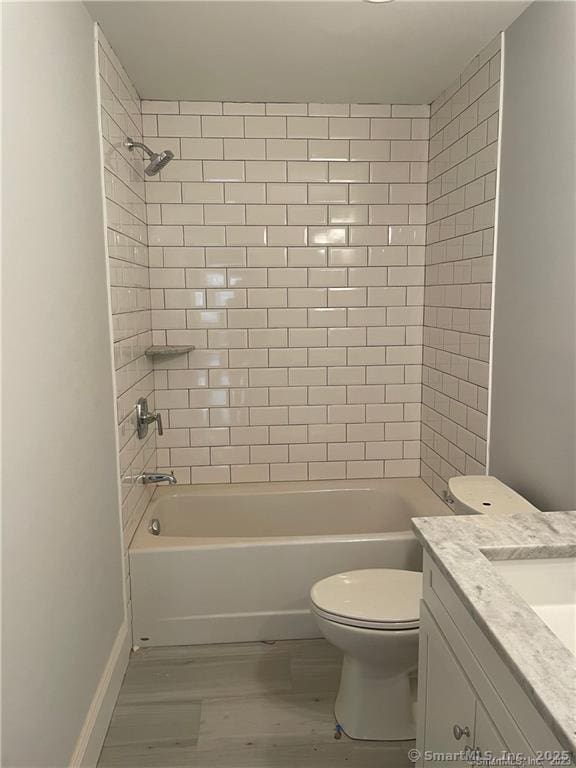 42 Long River Rd, Sherman, CT 06784 - bathroom with vanity, wood finished floors, and shower / washtub combination