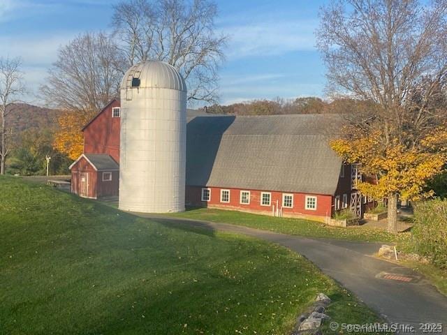 42 Long River Rd, Sherman, CT 06784 - view of property exterior with a yard, an outbuilding, a chimney, and a barn
