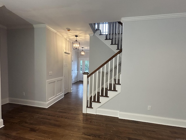 42 Long River Rd, Sherman, CT 06784 - staircase with wood finished floors, a chandelier, and crown molding