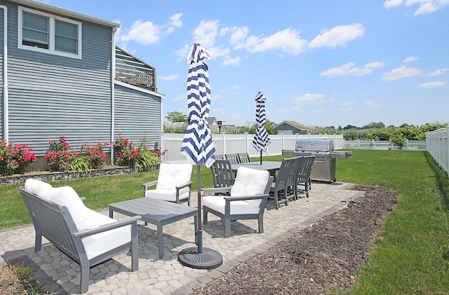 96 Chalker Beach Rd, Old Saybrook, CT 06475 - fenced backyard featuring grilling area, a patio area, outdoor lounge area, and outdoor dining area
