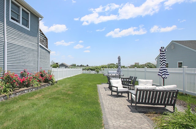 96 Chalker Beach Rd, Old Saybrook, CT 06475 - fenced backyard featuring an outdoor living space and a patio area