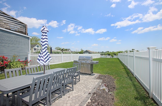 96 Chalker Beach Rd, Old Saybrook, CT 06475 - fenced backyard with outdoor dining area and a patio area