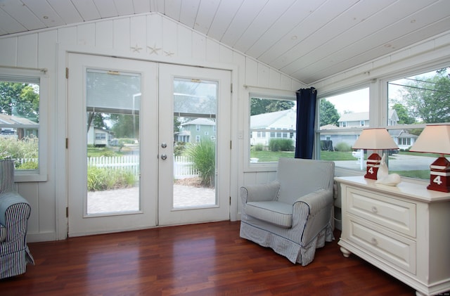 96 Chalker Beach Rd, Old Saybrook, CT 06475 - sitting room featuring lofted ceiling, healthy amount of natural light, dark wood-style floors, wooden ceiling, and wood walls