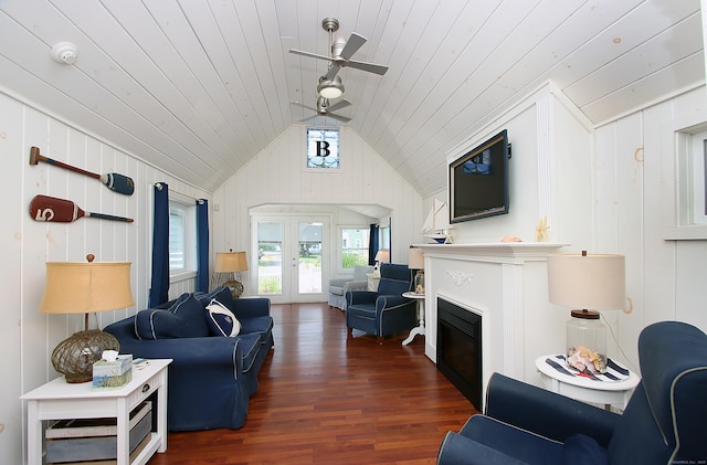 96 Chalker Beach Rd, Old Saybrook, CT 06475 - living room with vaulted ceiling, wood finished floors, a ceiling fan, wooden ceiling, and a glass covered fireplace