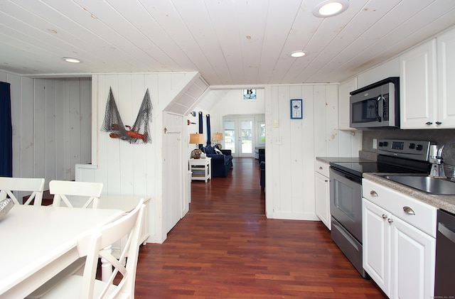 96 Chalker Beach Rd, Old Saybrook, CT 06475 - kitchen featuring appliances with stainless steel finishes, wooden ceiling, dark wood-style floors, recessed lighting, and white cabinets