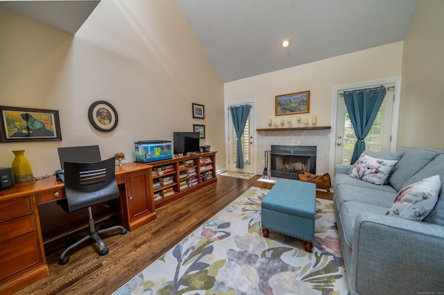 170 Turtle Bay Dr Unit 170, Branford, CT 06405 - living area with dark wood finished floors, a desk, high vaulted ceiling, and a tile fireplace