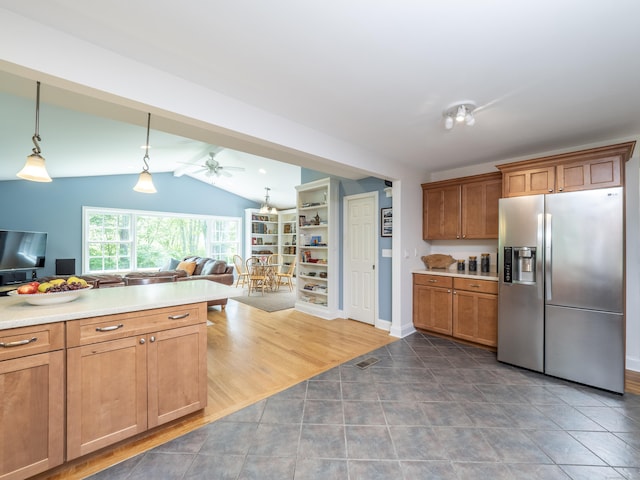109 Westport Rd, Wilton, CT 06897 - kitchen featuring stainless steel fridge with ice dispenser, open floor plan, light countertops, vaulted ceiling, and ceiling fan
