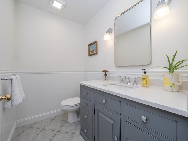 109 Westport Rd, Wilton, CT 06897 - bathroom with vanity, wainscoting, and tile patterned floors