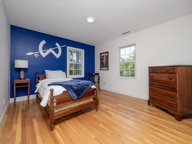 109 Westport Rd, Wilton, CT 06897 - bedroom with light wood-style flooring and multiple windows