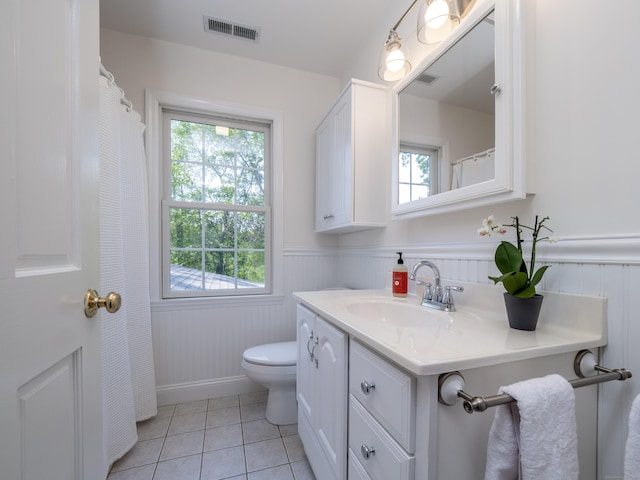 109 Westport Rd, Wilton, CT 06897 - bathroom featuring vanity, tile patterned flooring, and wainscoting