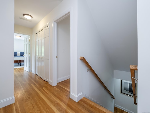 109 Westport Rd, Wilton, CT 06897 - hall with an upstairs landing and light wood-style floors