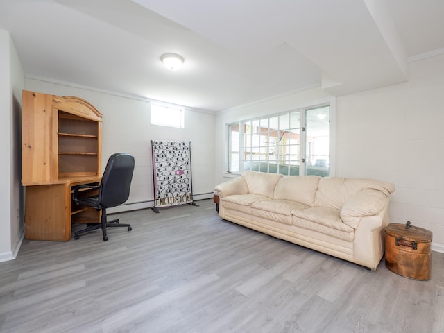 109 Westport Rd, Wilton, CT 06897 - office featuring wood finished floors, concrete block wall, and a baseboard heating unit