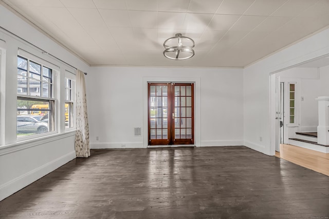 314 Judson Pl, Bridgeport, CT 06610 - unfurnished dining area featuring dark wood-type flooring and french doors