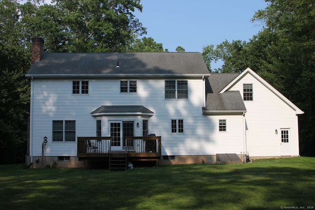 475 Niederwerfer Rd, South Windsor, CT 06074 - back of property with a deck, a chimney, a yard, and roof with shingles