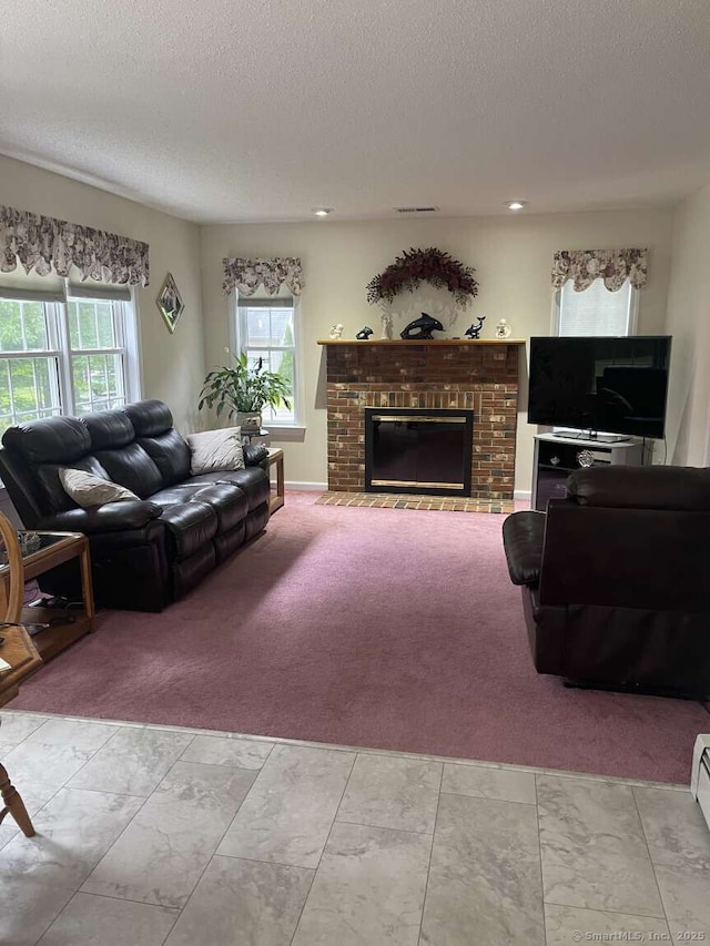 475 Niederwerfer Rd, South Windsor, CT 06074 - living area featuring light carpet, plenty of natural light, a textured ceiling, and a fireplace