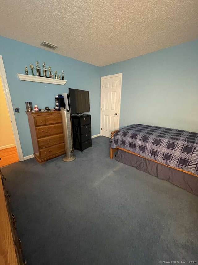475 Niederwerfer Rd, South Windsor, CT 06074 - bedroom featuring carpet floors and a textured ceiling