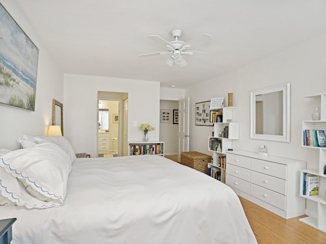 155 Brewster St Apt 3K, Bridgeport, CT 06605 - bedroom with light wood-type flooring, ensuite bathroom, and ceiling fan