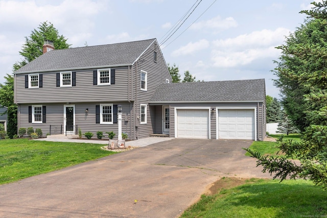 114 Boulter Rd, Wethersfield, CT 06109 - colonial-style house with a chimney, an attached garage, driveway, a front yard, and a shingled roof