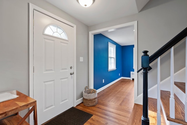 114 Boulter Rd, Wethersfield, CT 06109 - entryway with wood finished floors and stairs