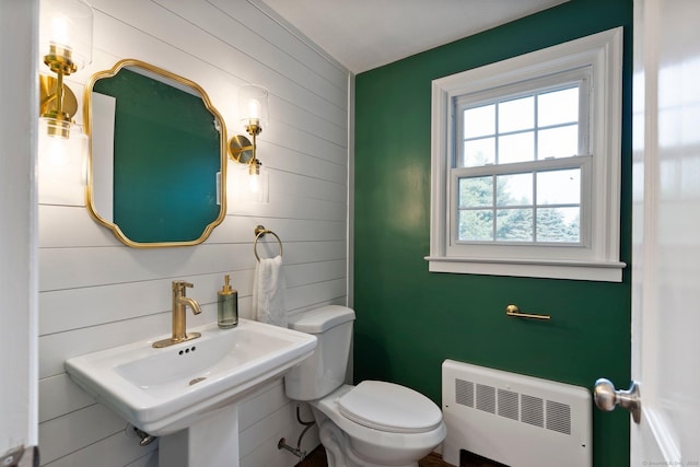 114 Boulter Rd, Wethersfield, CT 06109 - half bath featuring radiator heating unit and wooden walls