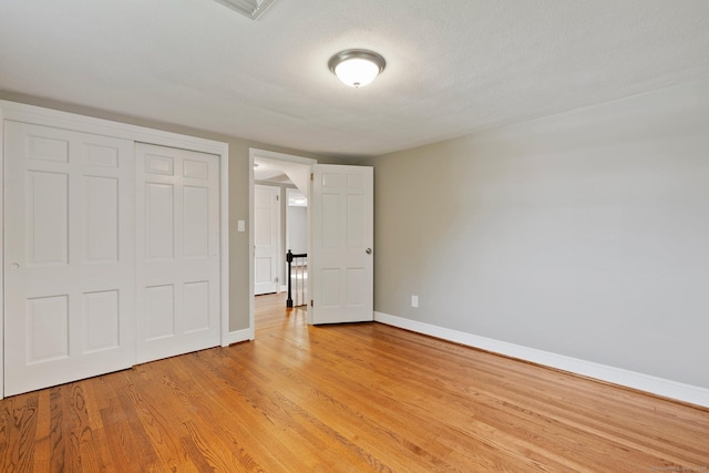 114 Boulter Rd, Wethersfield, CT 06109 - unfurnished bedroom featuring light wood finished floors and a closet