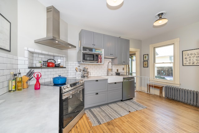 45 Harris Fuller Rd, Preston, CT 06365 - kitchen featuring stainless steel appliances, island range hood, gray cabinetry, and light countertops