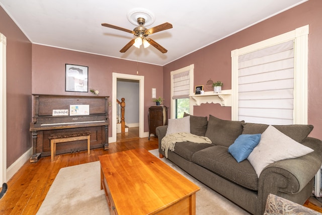 45 Harris Fuller Rd, Preston, CT 06365 - living room featuring a ceiling fan, wood-type flooring, and crown molding