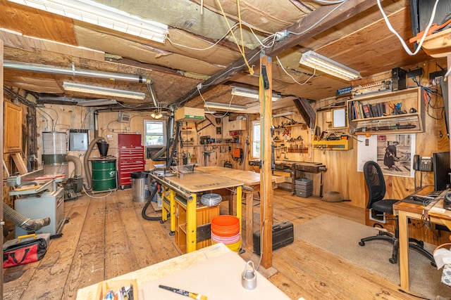 45 Harris Fuller Rd, Preston, CT 06365 - basement with electric panel, a workshop area, and hardwood / wood-style floors