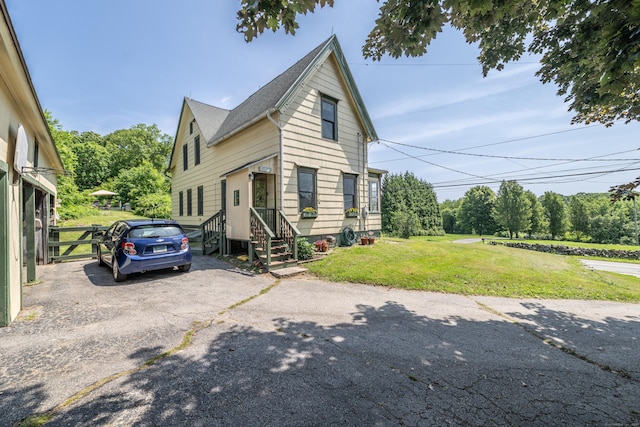 45 Harris Fuller Rd, Preston, CT 06365 - view of front of property with driveway and roof with shingles