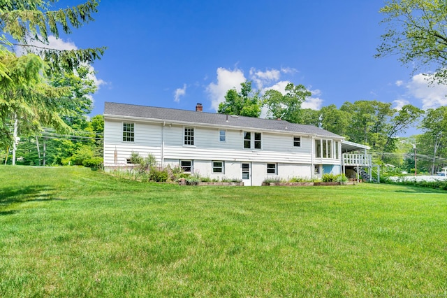442 Merrow Rd, Tolland, CT 06084 - back of property with a yard and a chimney