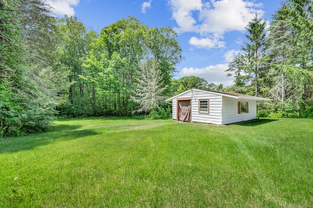 442 Merrow Rd, Tolland, CT 06084 - view of grassy yard featuring an outbuilding and a wooded view