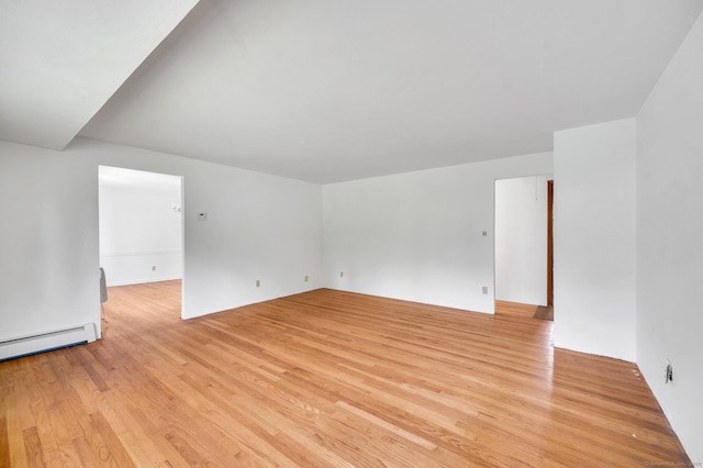 442 Merrow Rd, Tolland, CT 06084 - spare room with light wood-type flooring and a baseboard radiator