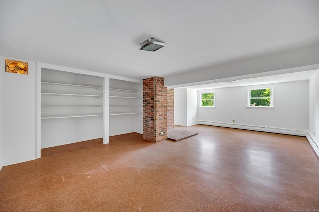 442 Merrow Rd, Tolland, CT 06084 - unfurnished living room featuring a baseboard heating unit and built in shelves