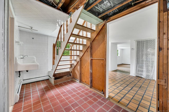 442 Merrow Rd, Tolland, CT 06084 - stairs with tile patterned flooring and tile walls