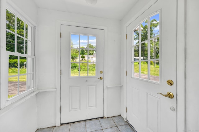 442 Merrow Rd, Tolland, CT 06084 - entryway with light tile patterned floors and healthy amount of natural light