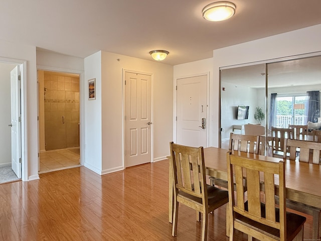 34 Schoolhouse Dr Unit 405, West Hartford, CT 06110 - dining area featuring wood finished floors and baseboards