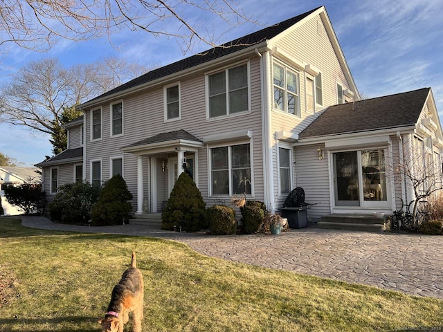 42 Bluff St, Westbrook, CT 06498 - view of front of house with a front yard and a patio