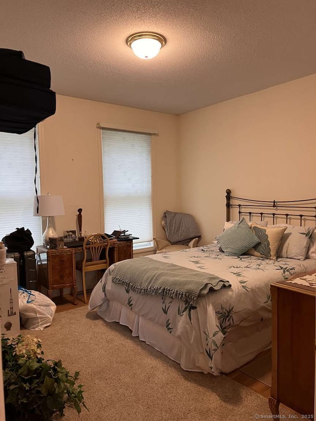 42 Bluff St, Westbrook, CT 06498 - carpeted bedroom featuring a textured ceiling