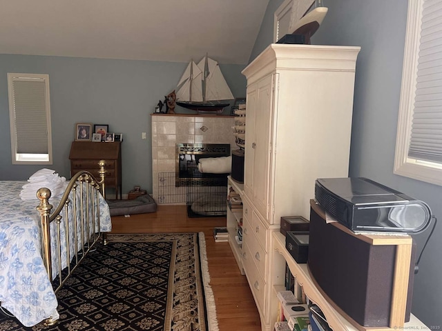 42 Bluff St, Westbrook, CT 06498 - bedroom with wood finished floors and lofted ceiling