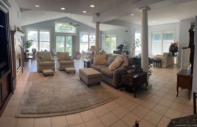 42 Bluff St, Westbrook, CT 06498 - living area featuring decorative columns, healthy amount of natural light, light tile patterned flooring, lofted ceiling, and recessed lighting