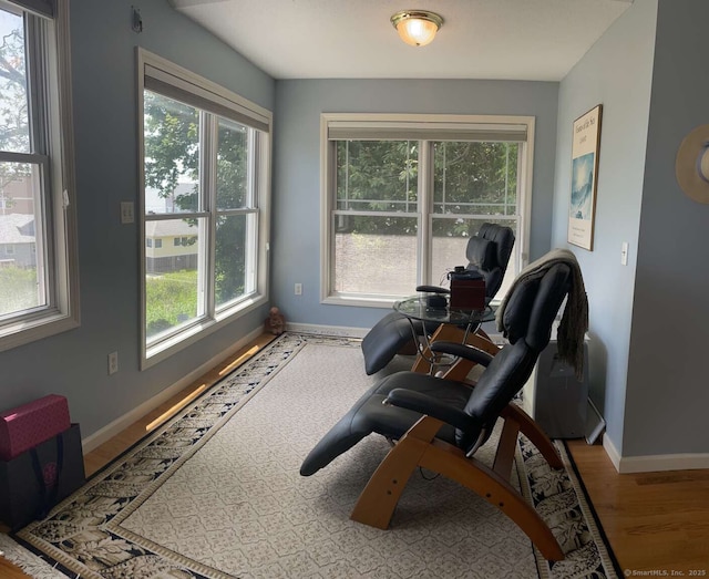 42 Bluff St, Westbrook, CT 06498 - sitting room featuring healthy amount of natural light and wood finished floors