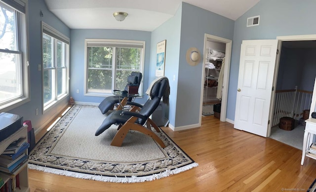 42 Bluff St, Westbrook, CT 06498 - living area featuring wood finished floors and lofted ceiling