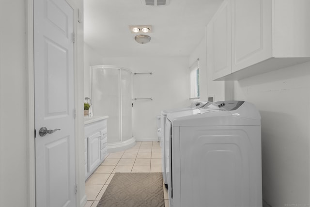 32 Glenview Dr Unit 32, Cromwell, CT 06416 - laundry area featuring washer and clothes dryer and light tile patterned floors