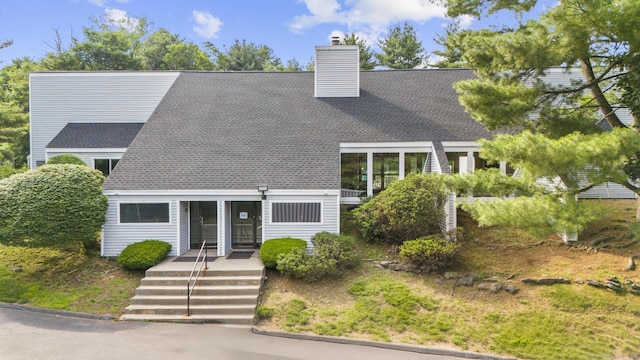 32 Glenview Dr Unit 32, Cromwell, CT 06416 - view of front facade featuring a chimney and roof with shingles