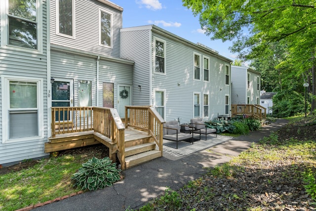 32 Glenview Dr Unit 32, Cromwell, CT 06416 - back of property with a deck and a patio area