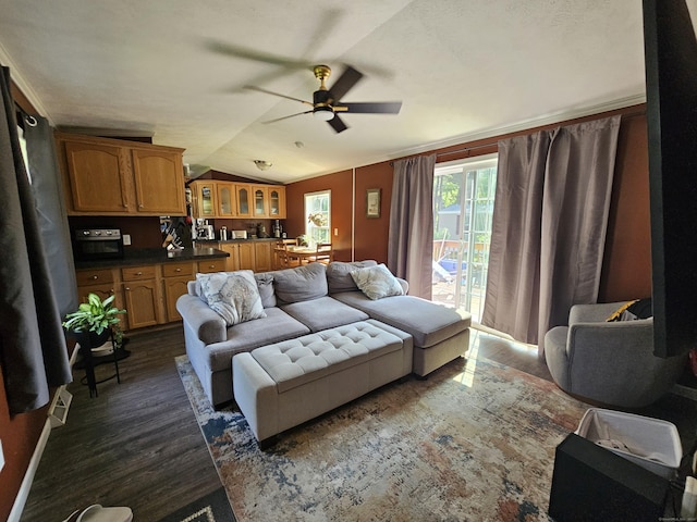 91 Chaffeeville Rd Trlr 16, Mansfield, CT 06250 - living room with vaulted ceiling, ceiling fan, and dark wood-style flooring
